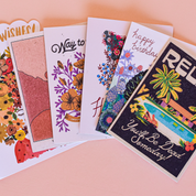 A selection of greeting cards laid out in a fan